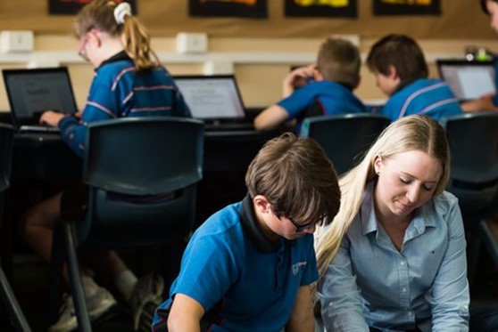 Teacher and students in classroom